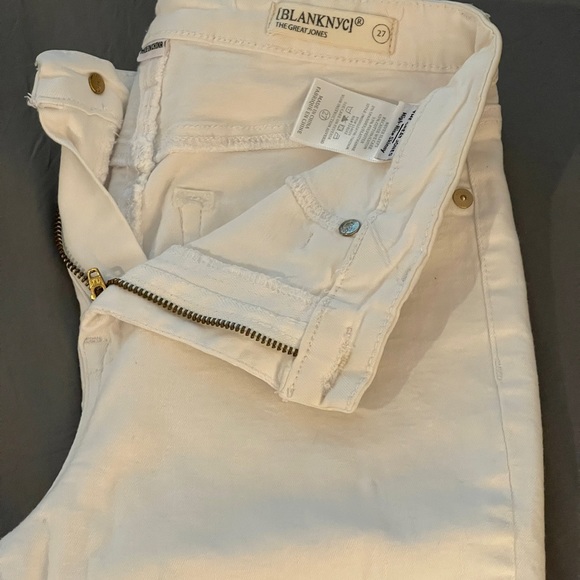 White skinny jeans with stretch and slightly distressed.  Never been worn. 27 - Picture 5 of 10